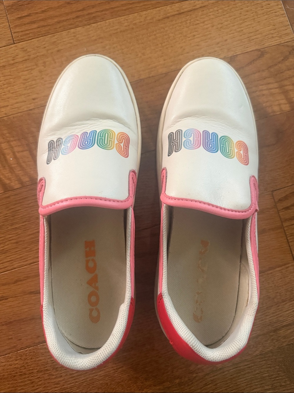 Coach White Slip-On Sneakers with Rainbow Logo and Pink Trim